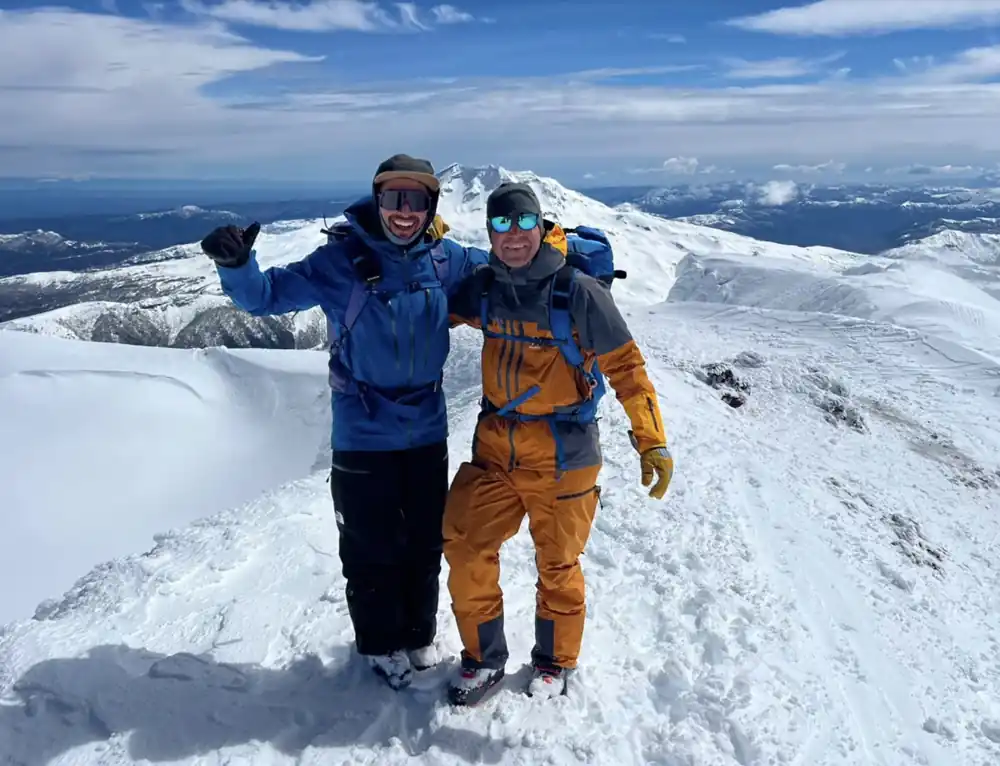 Jon Brizuela and his Esnativa guide on a volcano summit in the Araucanía region of Chile